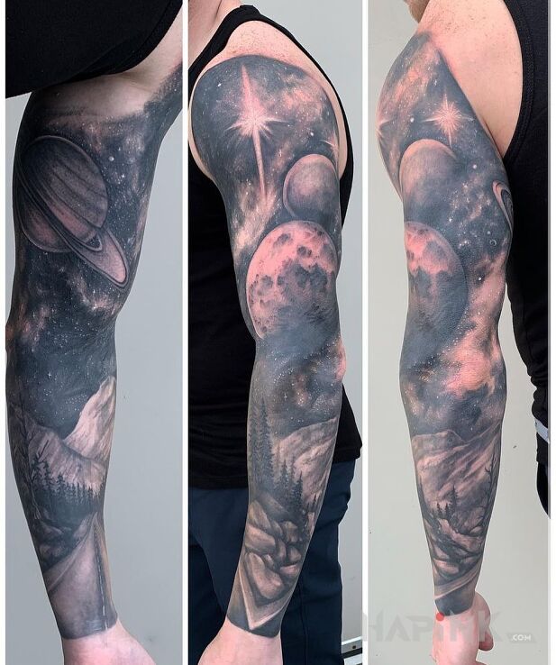 Tattoo Cosmo in black and gray motif and realistic style on the upper arm