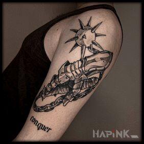 Tattoo Medieval vibe on the upper arm motif: black and gray style: graphic / illustrative