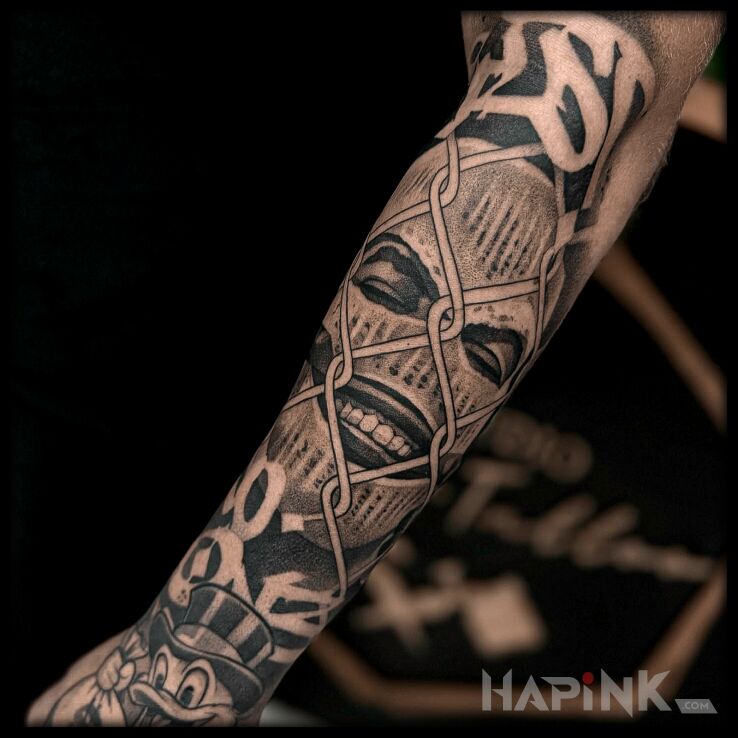 Tattoo Balaklawa in black and gray motif and realistic style on the forearm