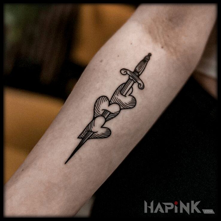 Tattoo Serduszka na sztyleciku in objects motif and engravings / gravure style On the arm