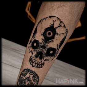Tattoo Three-eyed skull on the leg motif: dark style: graphic / illustrative