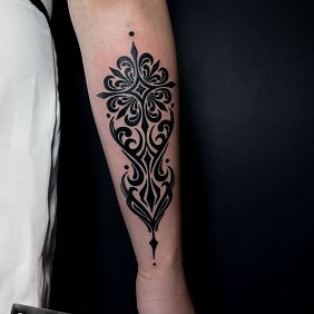 Tattoo BLACK ORNAMENT on the forearm motif: ornaments style: blackwork / blackout
