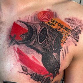 Tattoo RAVEN ENCHANTED IN A SPEAKER on the chest motif: lettering style: trash polka