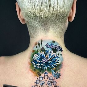 Tattoo BLUE EMBROIDERED FLOWERS on the back motif: colorful style: realistic