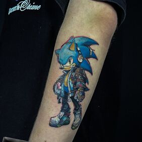Tattoo Blue SONIC on the forearm motif: funny style: cartoon / comic book