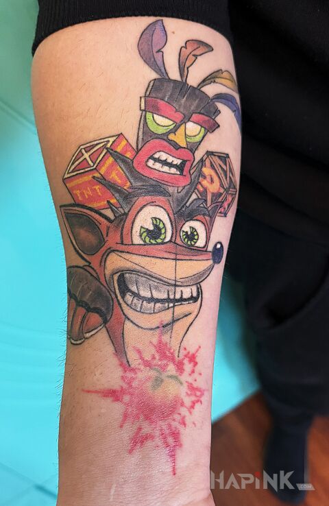 Tattoo BANDICOOT in characters motif and cartoon / comic book style On the arm