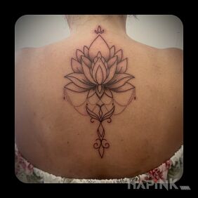 Tattoo MANDALA FLOWER LOTUS on the back motif: flowers style: graphic / illustrative