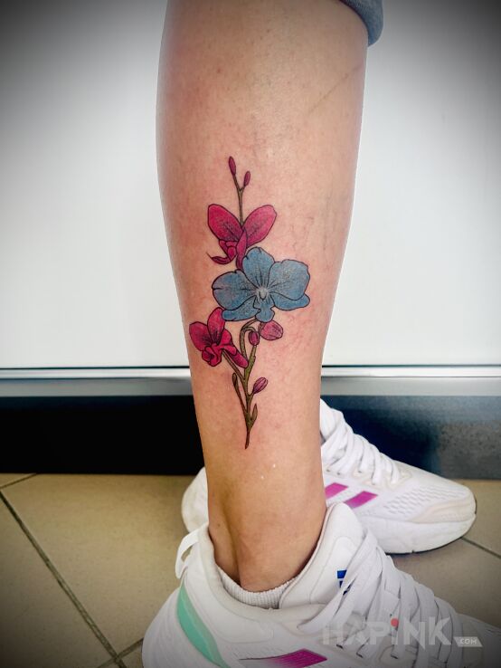 Tattoo ORCHID in floral motif and graphic / illustrative style on the leg