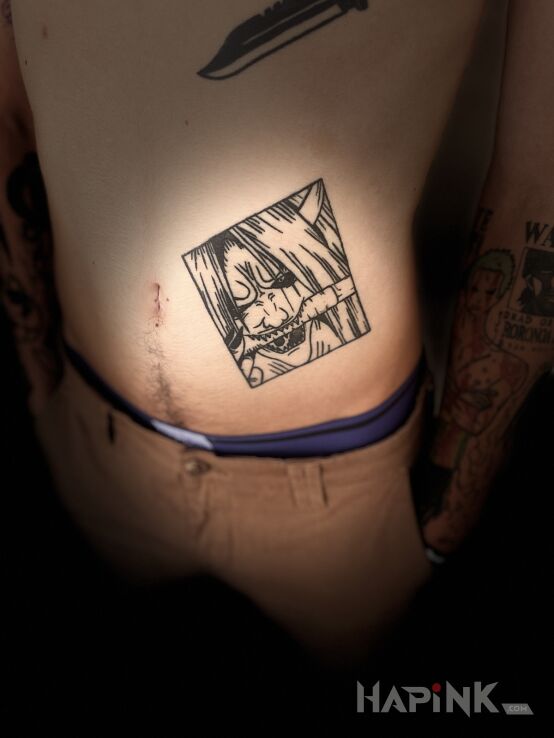Tattoo GOD OF DEATH in black and gray motif and contour / linework style on the stomach