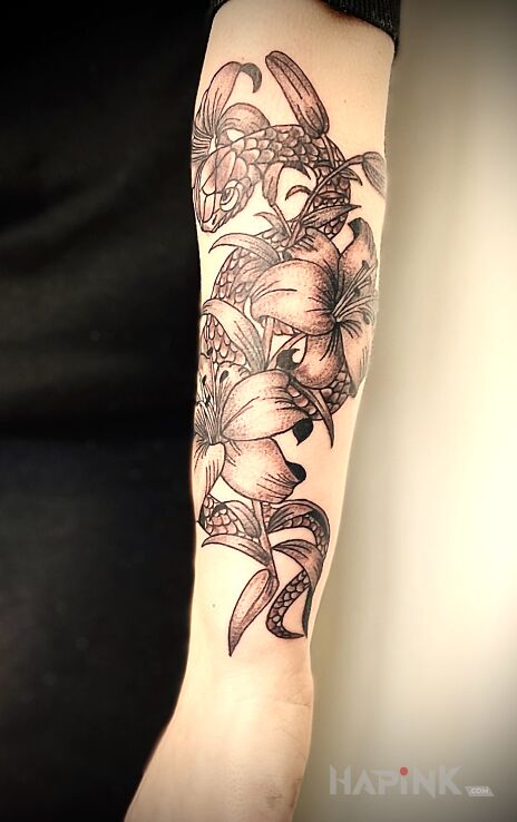 Tattoo LILY WITH SNAKE in animals motif and graphic / illustrative style On the arm
