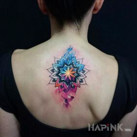 Tattoo Bright mandala on the back motif: colorful style: Watercolor