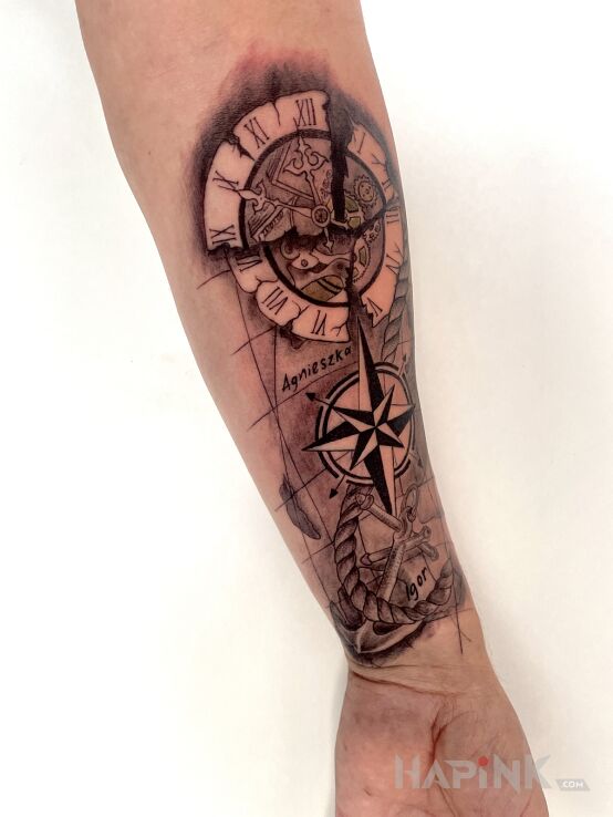 Tattoo CLOCK AND MAP in objects motif and realistic style on the forearm