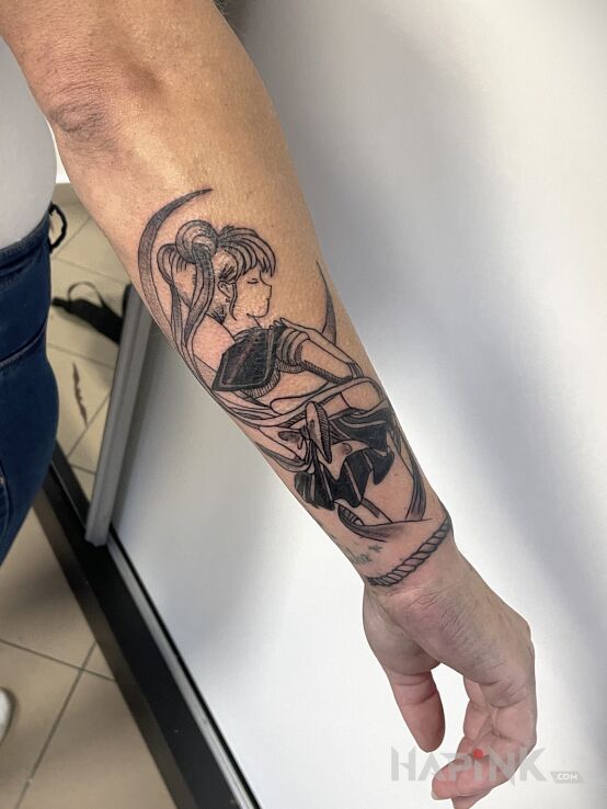 Tattoo MOON WITCH in characters motif and graphic / illustrative style On the arm