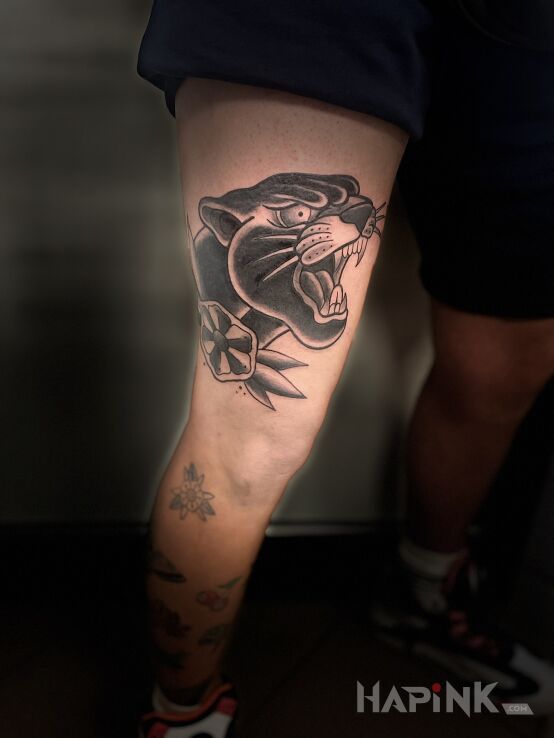 Tattoo BLACK PANTHER in black and gray motif and oldschool style on the leg
