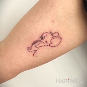Tattoo JERRY On the arm motif: black and gray style: contour / linework