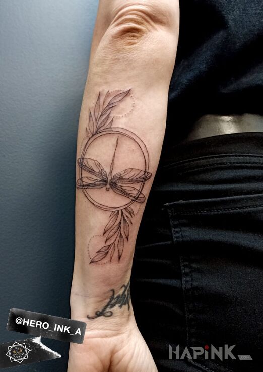 Tattoo DRAGONFLY WITH BRANCHES in insects motif and graphic / illustrative style on the forearm