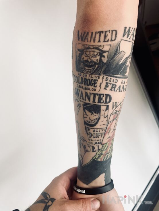 Tattoo One piece 3 in black and gray motif and graphic / illustrative style On the arm