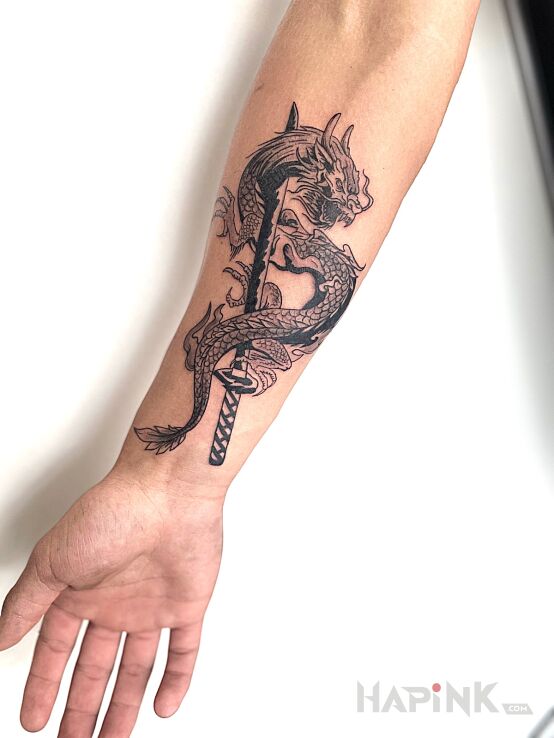 Tattoo Dragon coiling around a katana in fantasy motif and graphic / illustrative style On the arm