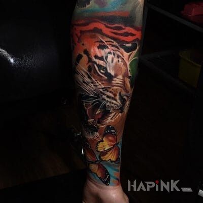 Tattoo Tygrys in 3D motif and realistic style on the forearm