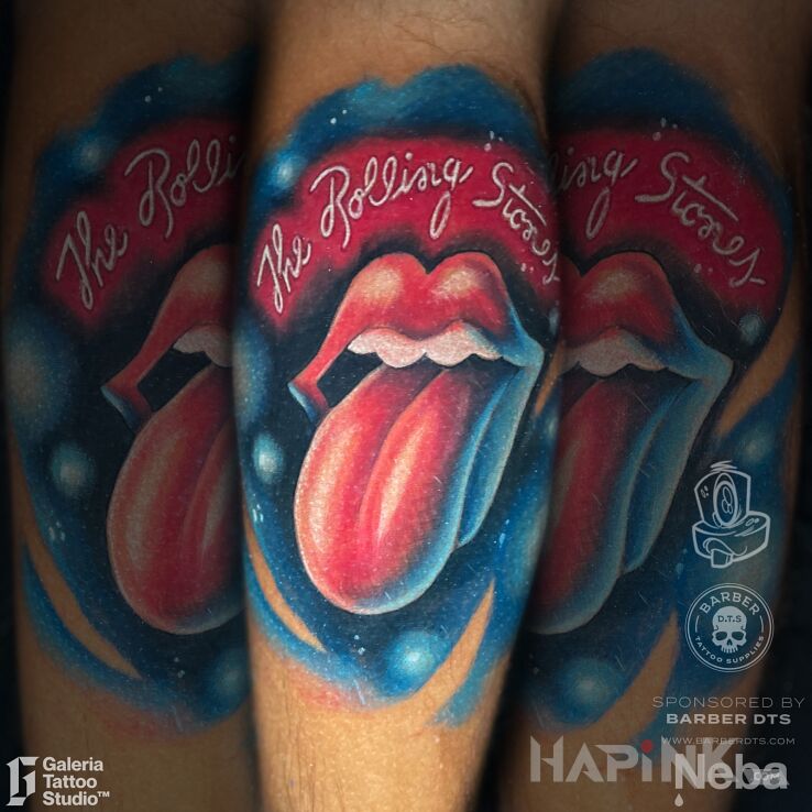 Tattoo The Rolling Stones logo in lettering motif and newschool style on the thigh