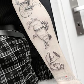 Tattoo Travelers on the forearm motif: black and gray style: graphic / illustrative