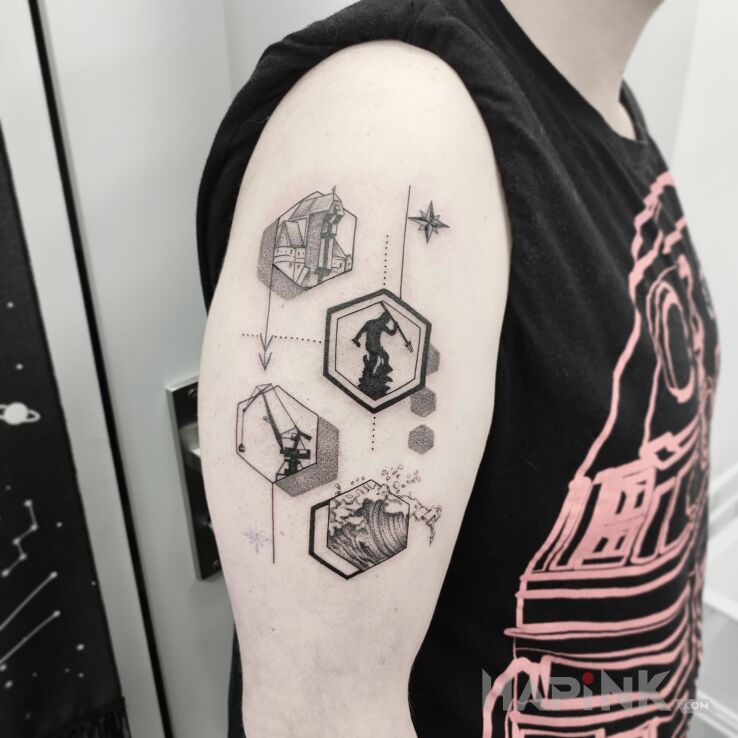 Tattoo Gdańsk in black and gray motif and graphic / illustrative style on the upper arm