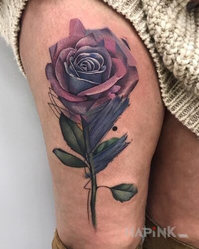 Tattoo Piekny kwiat in flowers motif and realistic style on the leg