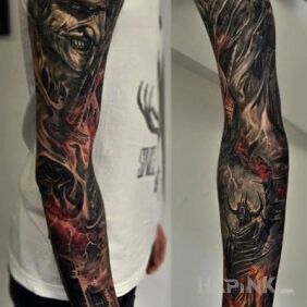 Tattoo Sinister sleeve on the upper arm motif: sleeves style: realistic