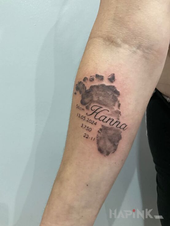 Tattoo Stópka in black and gray motif and graphic / illustrative style On the arm