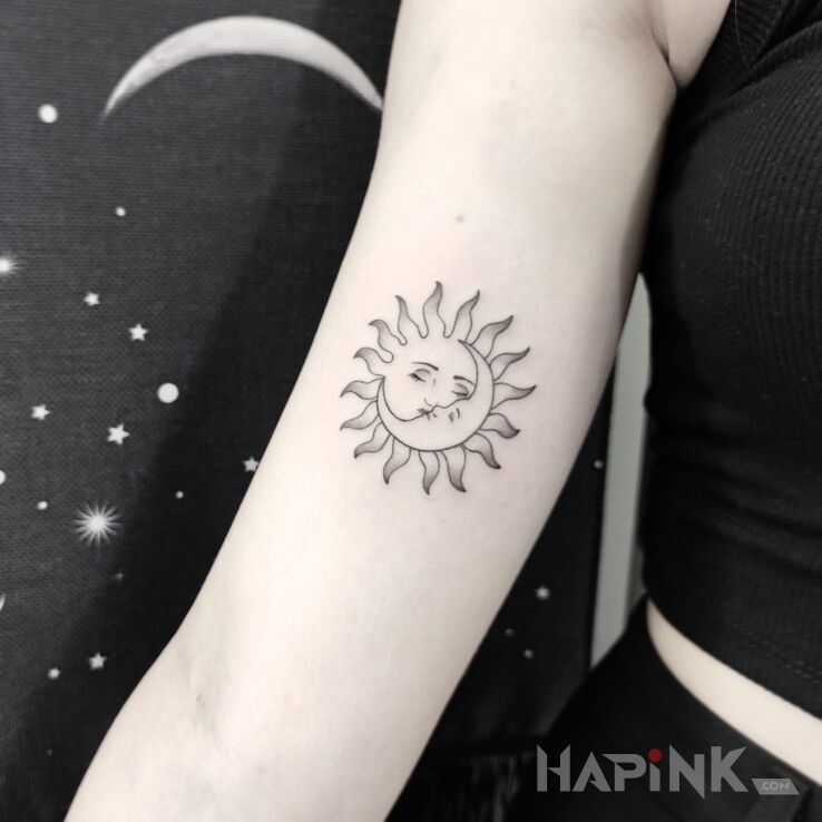 Tattoo Słońce i księżyc in fantasy motif and graphic / illustrative style On the arm