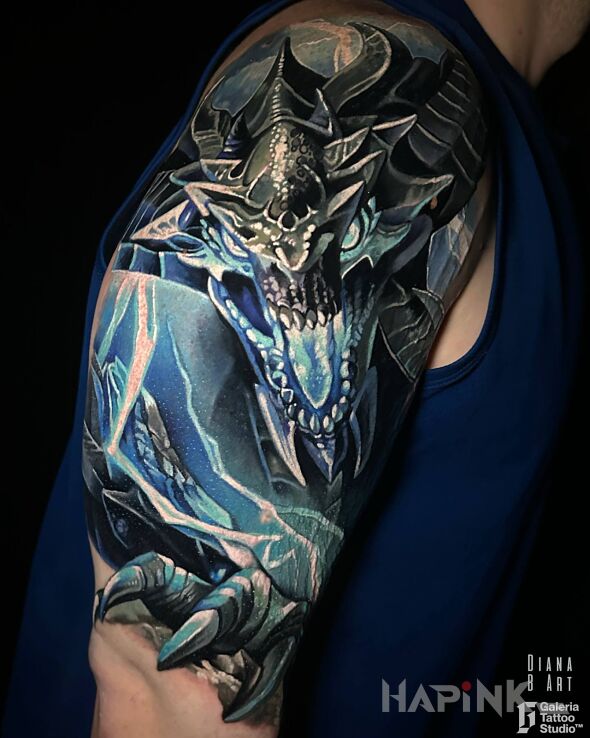 Tattoo Smok Beritra z gry Aion in dragons motif and realistic style on the upper arm