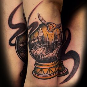 Tattoo Harry Potter On the arm motif: colorful style: graphic / illustrative