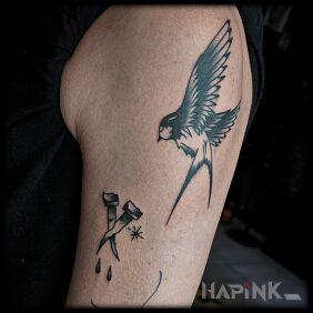Tattoo Swallow and nails On the arm motif: objects style: oldschool
