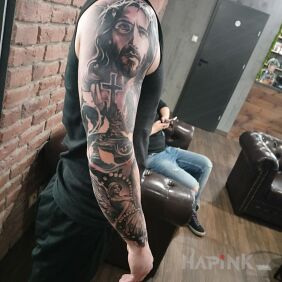Tattoo Jesus and the Guardian Angel on the forearm motif: characters style: realistic