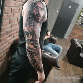 Tatuaż Jezus i Anioł stróż na przedramieniu motyw: anioły styl: realistyczne