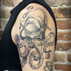 Tattoo Cosmic Octopus on the upper arm motif: animals style: graphic / illustrative