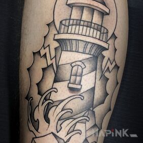 Tattoo Oldschool Lighthouse on the calf motif: black and gray style: graphic / illustrative