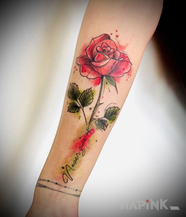 Tattoo Little Rose 🤩 in lettering motif and graphic / illustrative style On the arm