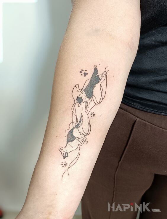 Tattoo Przyjaciele in black and gray motif and graphic / illustrative style On the arm