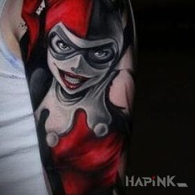 Tattoo Harley Quinn on the upper arm motif: characters