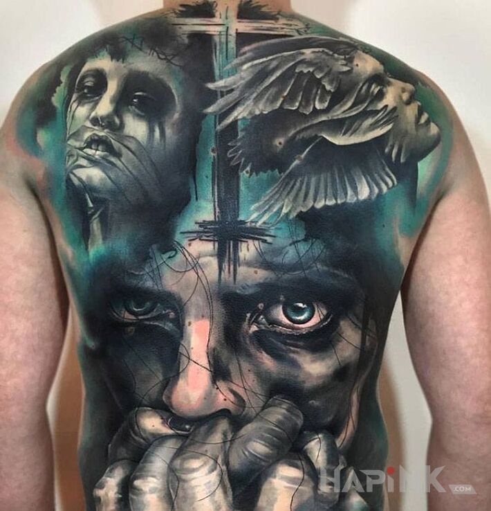 Tattoo Usta zamknięte in faces motif on the back