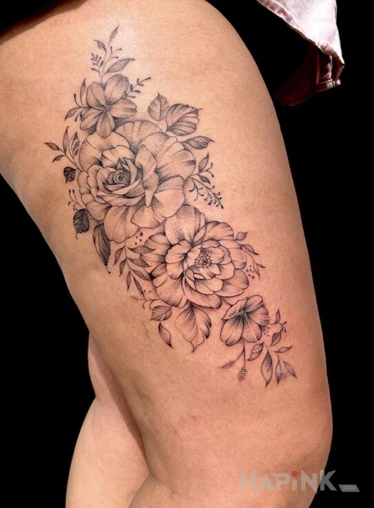 Tattoo Kwiaty na udzie in floral motif and graphic / illustrative style on the leg
