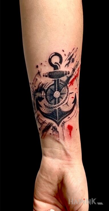 Tattoo Kotwica na przedramieniu cover up in black and gray motif and trash polka style On the arm