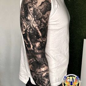 Tattoo Sleeve - SKY TATTOO SZCZECIN on the shoulder motif: black and gray style: realistic