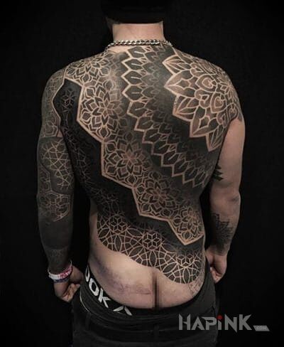 Tattoo Spójny wzór in mandalas motif and dotwork style on the back