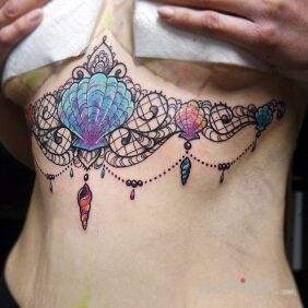 Tattoo Shells on the stomach motif: other