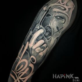 Tattoo Chicano Gangster Realism On the arm motif: lettering style: chicano