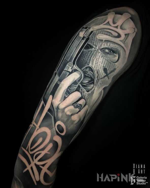 Tattoo Gangster Chicano realizm in lettering motif and graffiti style On the arm
