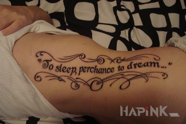 Tattoo To sleep, perchance to dream... in lettering motif on the ribs