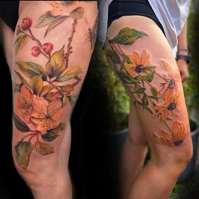 Tattoo Floral compositions in full color on the thigh motif: colorful style: realistic